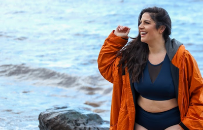 Madeleine wears size 16 Monroe Top, size 16 Bottoms