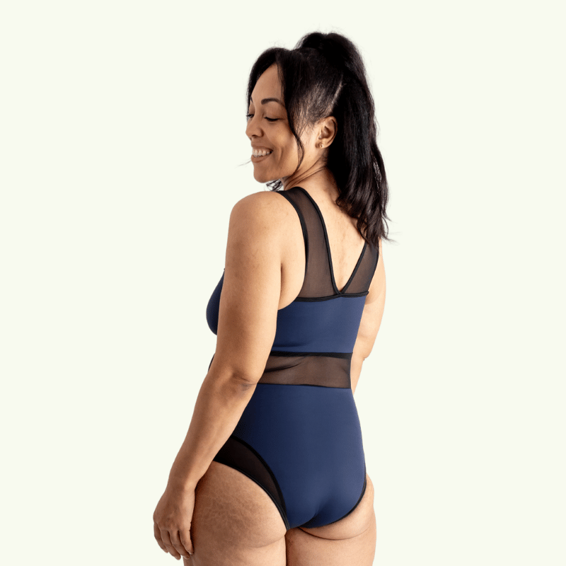 (L-R) Kelly wears Signature Swimsuit size 12 Monroe, Swim Shorts size 14; Abi wears Essential Swimsuit size 10 Hepburn