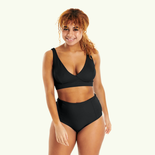 (L-R) Ebbi wears Plunge Bikini Top size 10 Monroe, High Waist Bikini Bottoms size 10: Asha wears X-Back Swimsuit size 12 Monroe; Tirion wears Plunge Bikini Top size 10 Monroe, High Waist Bikini Bottoms size 10